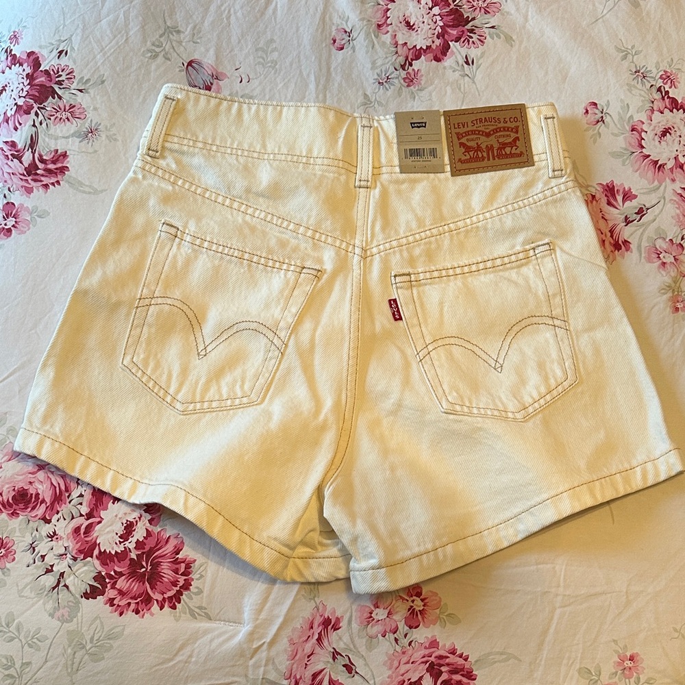 Levi's High-Waist Cream Denim Shorts - Picture 2 of 3